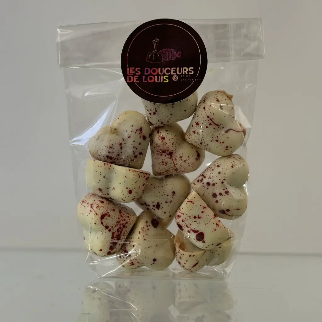 Cœurs chocolat blanc fourrés caramel à la framboise